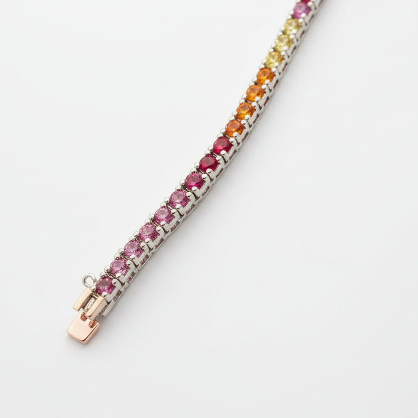 Multicolored gemstone bracelet on a white background