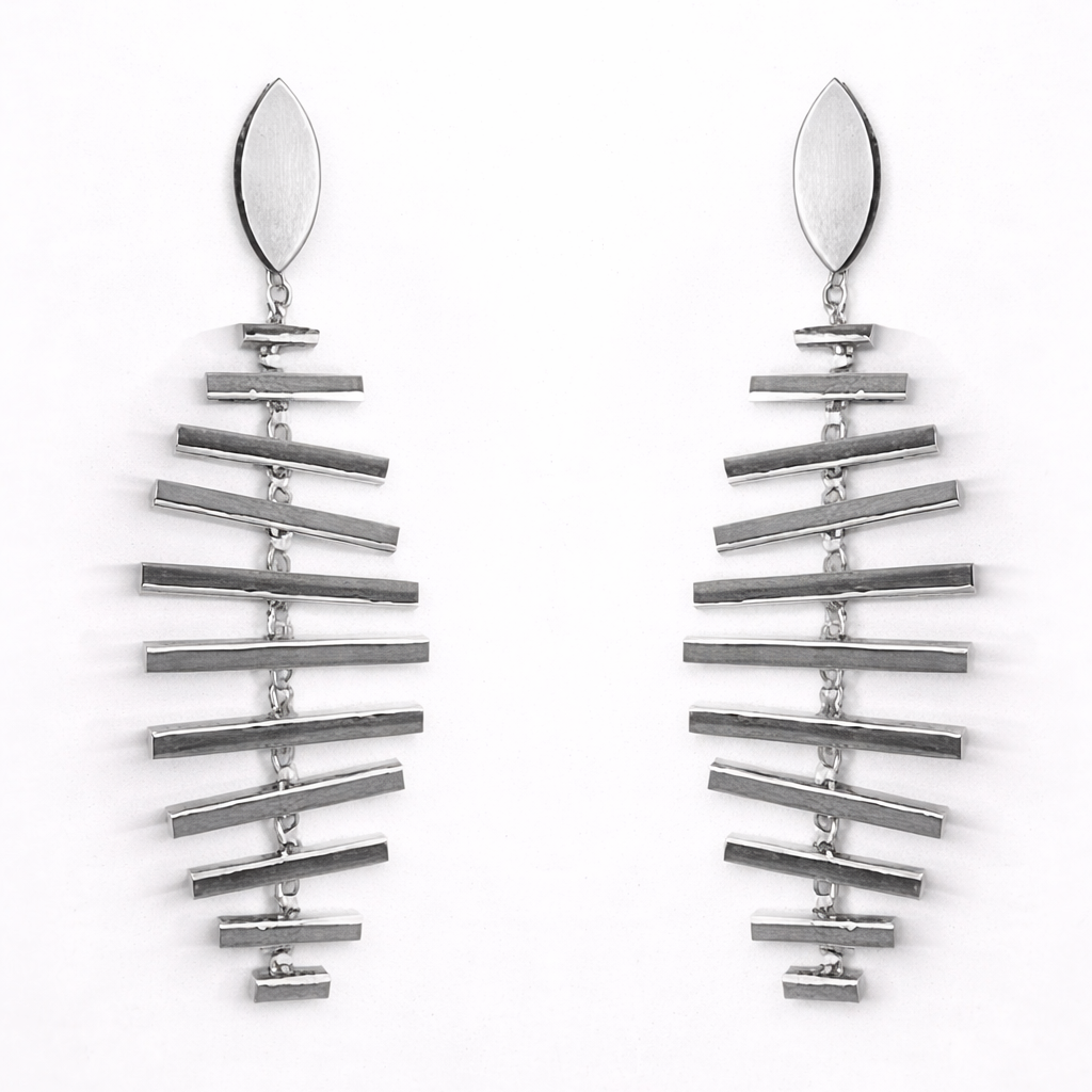 Pair of silver earrings on a white background