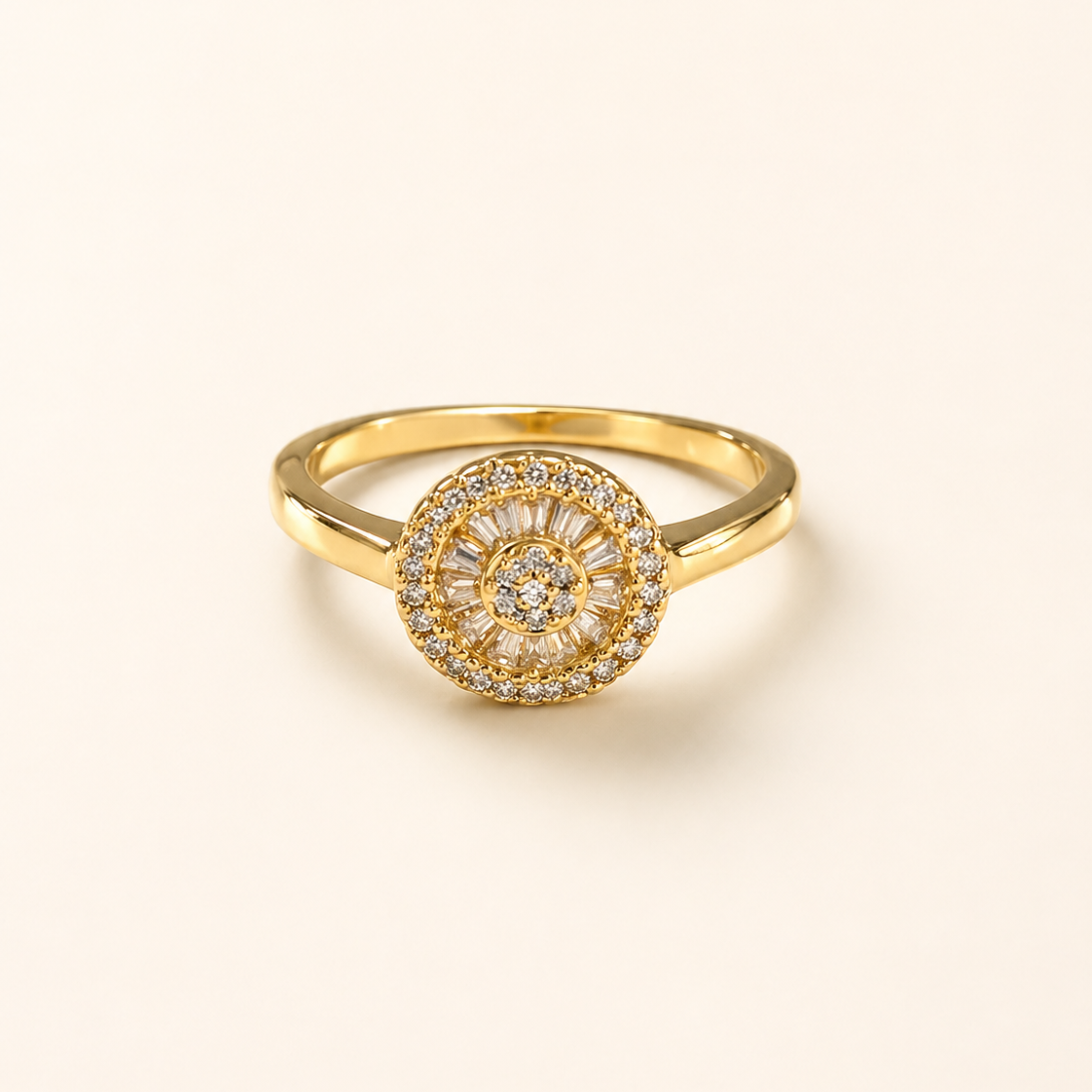 Gold ring with diamond accents on a light beige background