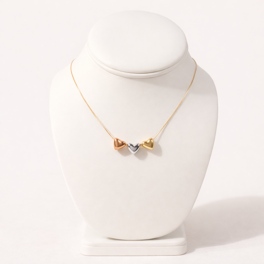 Necklace with a heart-shaped pendant on a white mannequin bust