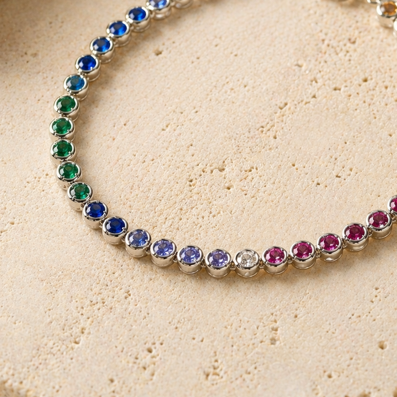 Multicolored beaded bracelet on a beige stone surface